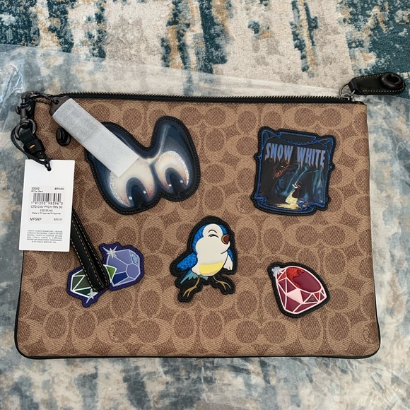 NWT Disney X Coach Turnlock Wristlet 30 In Signature Patchwork - Picture 1 of 6